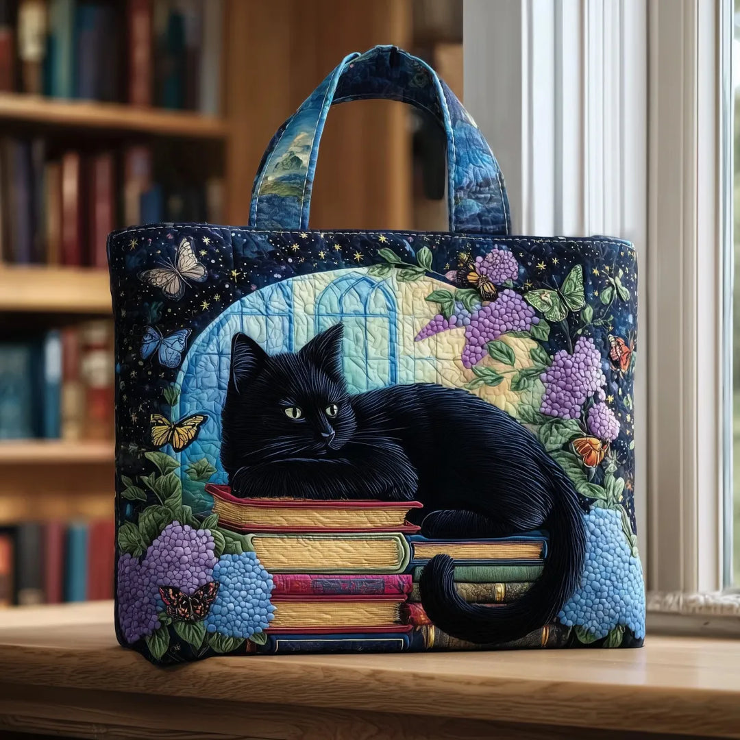 Bolsa artesanal Chat Noir sobre livros